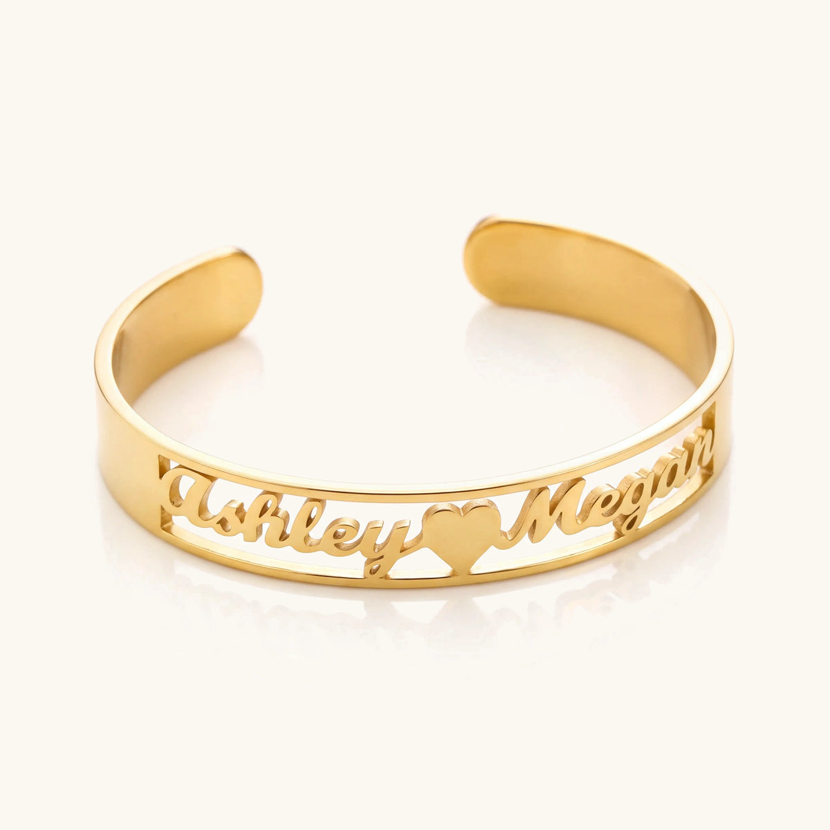 Engraved name detail on the personalised gold bangle
