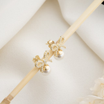 Load image into Gallery viewer, Gold Bow Pearl Dangle Earrings
