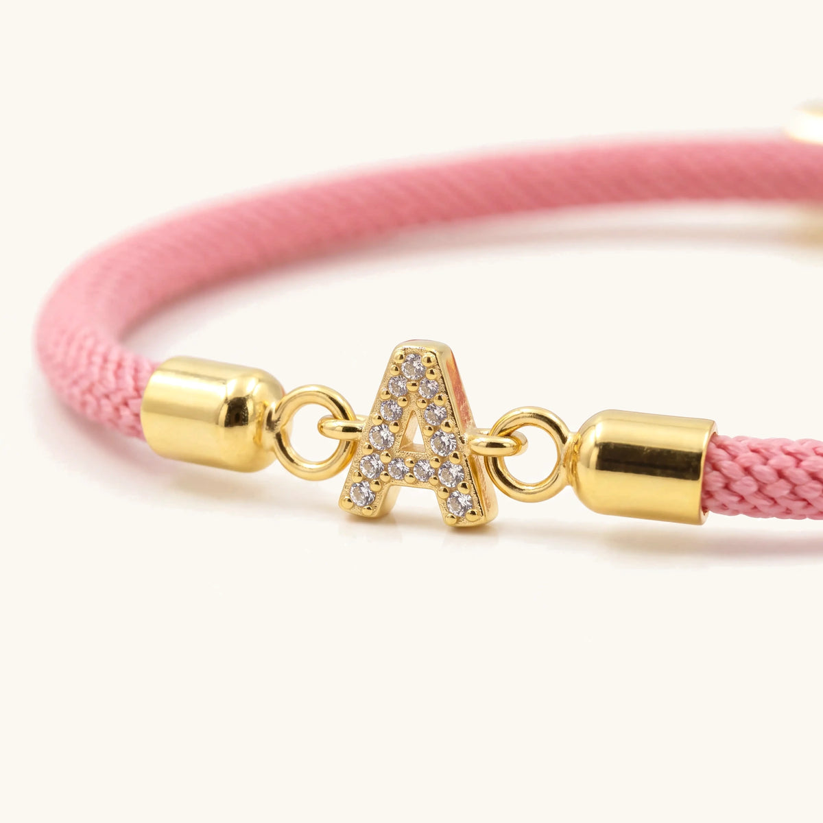 Adjustable Letter Initial Bracelet – close-up of the pavé initial and gold end caps