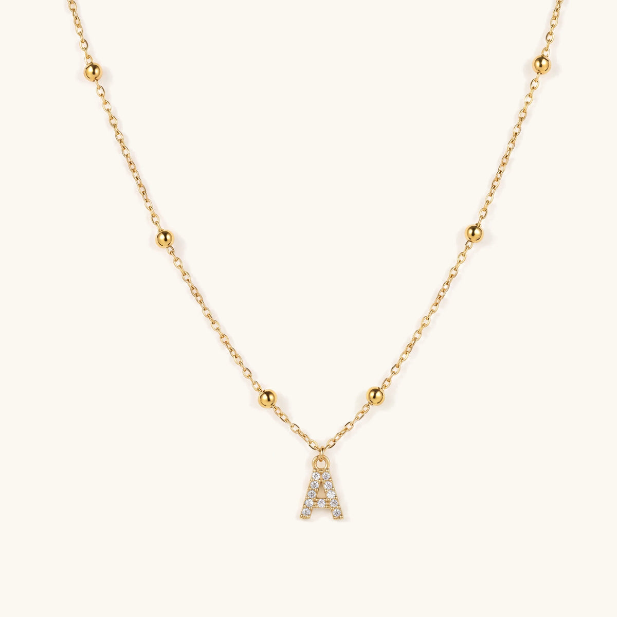 Dainty Beaded Chain Initial Necklace – pavé gold initial on a beaded satellite chain