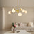 Modern 8-Light Gold Chandelier with White Glass Globe Shades