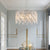 Luxurious Round Crystal Chandelier with Teardrop Crystals and Adjustable Height