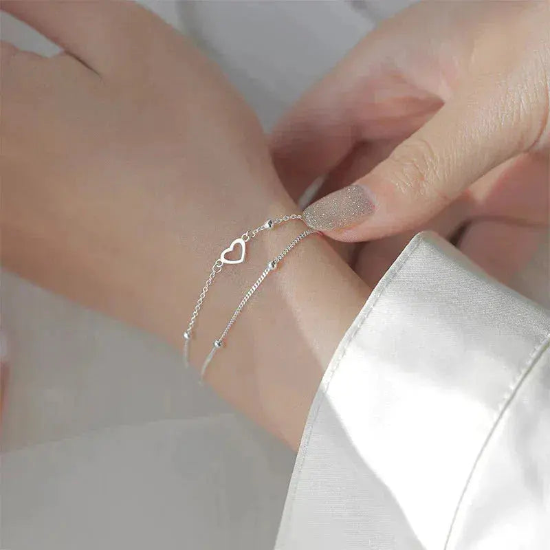 Bohemian heart charm bracelet in silver