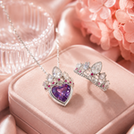 Load image into Gallery viewer, Rapunzel Crown Inspired Necklaces and Rings silver-toned jewelry set with a heart-shaped purple gemstone pendant and matching stud earrings on pink satin.
