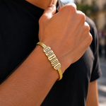 Load image into Gallery viewer, Personalized Family Name Herringbone Chain Bracelet gold bracelet with multiple rectangular nameplates engraved with initials displayed on a neutral background.
