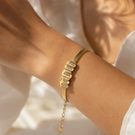 Load image into Gallery viewer, Personalized Family Name Herringbone Gold Bracelet

