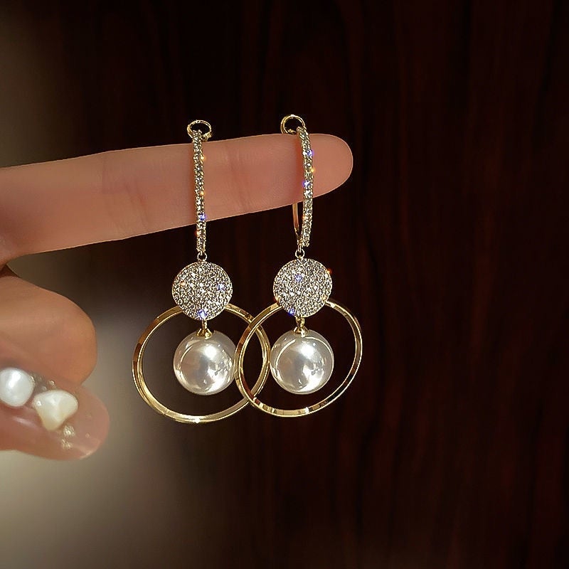 Delicate pearl drop earrings