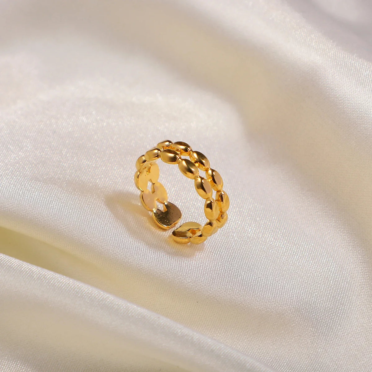 18k oval bead ring