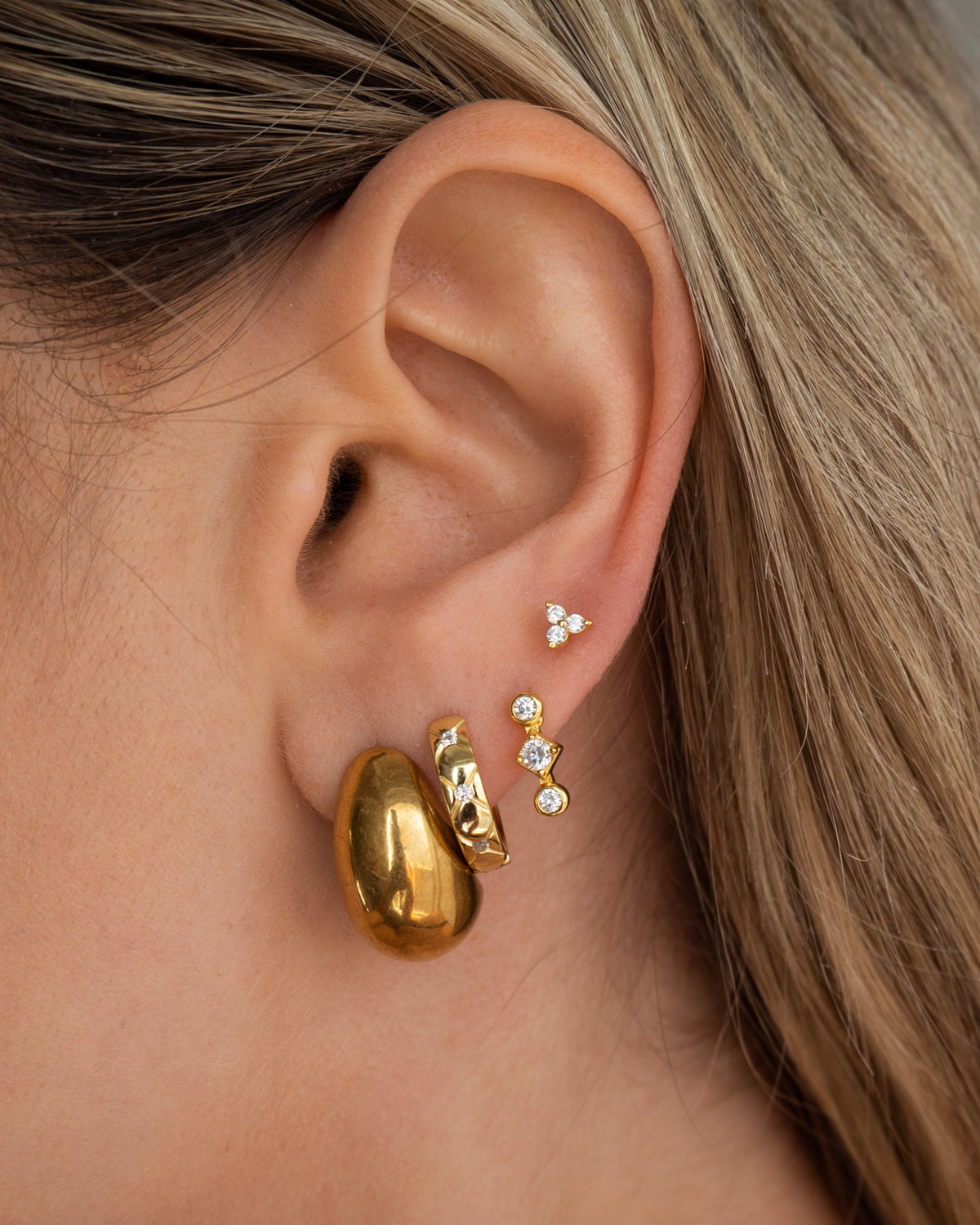 Gold triple crystal flower stud earrings