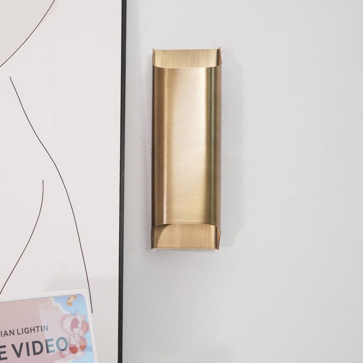 Circular Brass Nordic Inspired Wall Sconce
