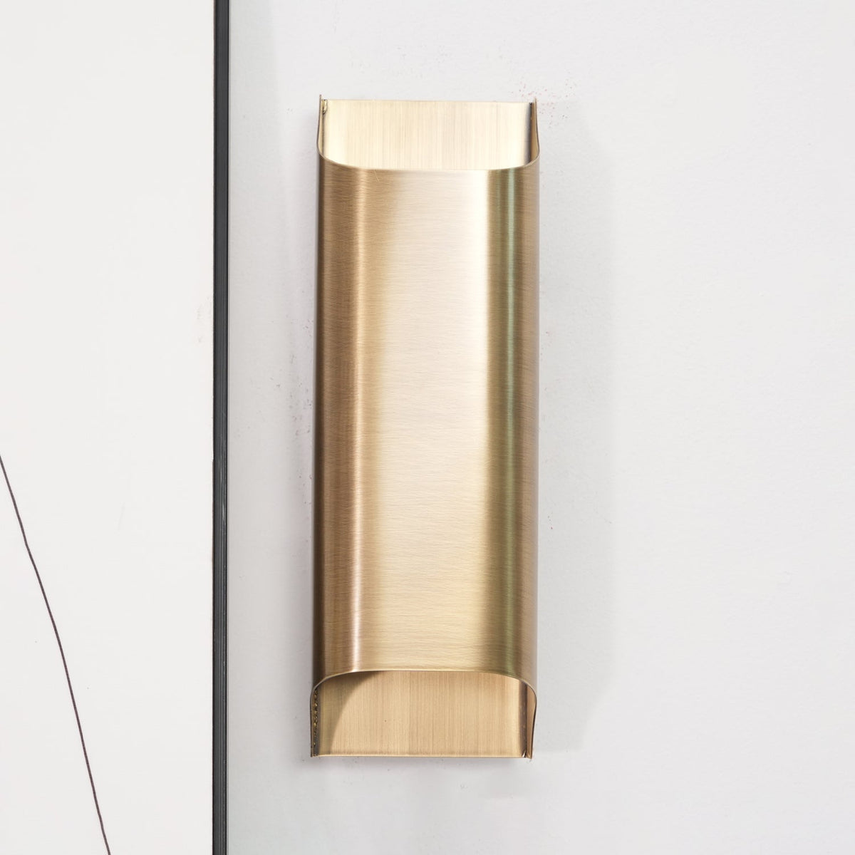 Circular Brass Nordic Inspired Wall Sconce