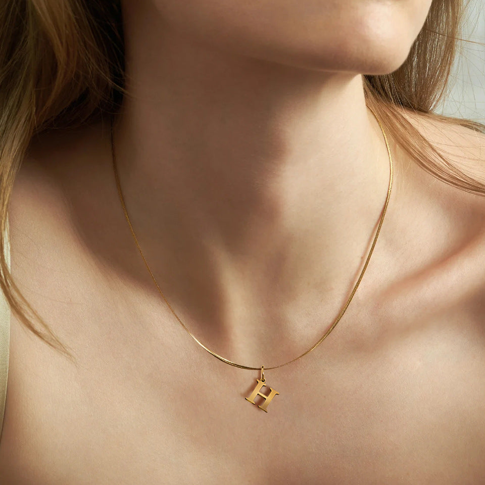 Minimal serif letter initial herringbone necklace
