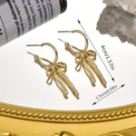 Load image into Gallery viewer, Dainty Dangle Bow Earrings
