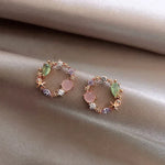 Load image into Gallery viewer, Sparkling Crystal Floral Earrings in Rose Gold
