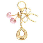 Load image into Gallery viewer, Bubble Initial With Bow &amp; Cherry Charms Keychain
