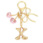 Load image into Gallery viewer, Bubble Initial With Bow &amp; Cherry Charms Keychain
