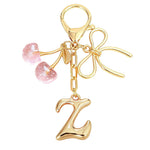 Load image into Gallery viewer, Bubble Initial With Bow &amp; Cherry Charms Keychain
