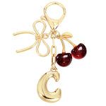 Load image into Gallery viewer, Bubble Initial With Bow &amp; Cherry Charms Keychain
