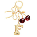 Load image into Gallery viewer, Bubble Initial With Bow &amp; Cherry Charms Keychain
