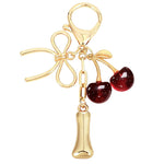 Load image into Gallery viewer, Bubble Initial With Bow &amp; Cherry Charms Keychain
