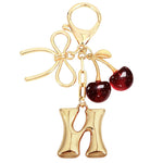 Load image into Gallery viewer, Bubble Initial With Bow &amp; Cherry Charms Keychain
