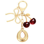 Load image into Gallery viewer, Bubble Initial With Bow &amp; Cherry Charms Keychain
