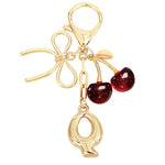 Load image into Gallery viewer, Bubble Initial With Bow &amp; Cherry Charms Keychain
