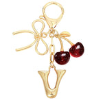 Load image into Gallery viewer, Bubble Initial With Bow &amp; Cherry Charms Keychain
