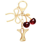 Load image into Gallery viewer, Bubble Initial With Bow &amp; Cherry Charms Keychain
