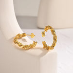 Load image into Gallery viewer, 14k Dainty Textured Spiral Hoop Earrings
