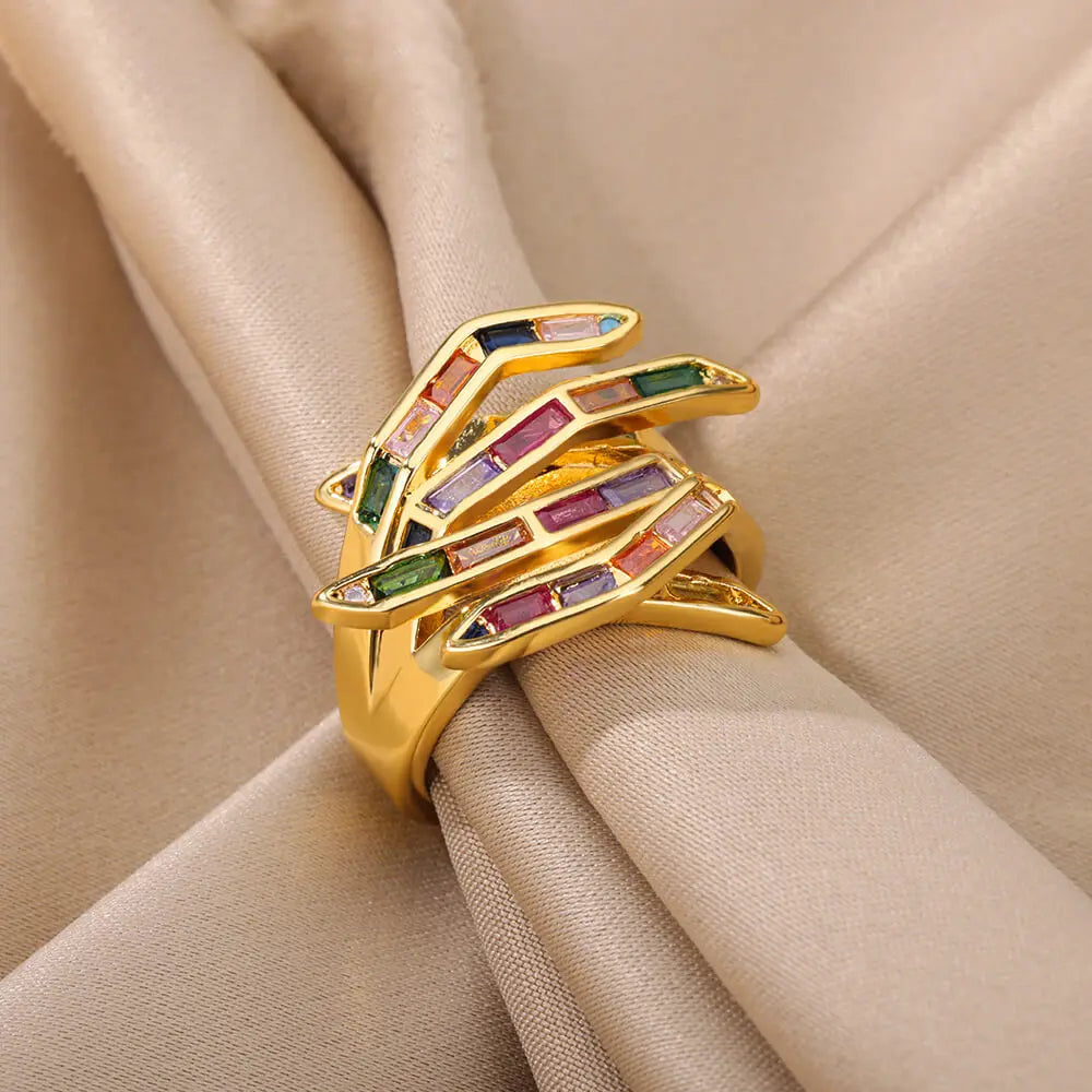 Geometric claw scattered diamond ring