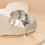 Load image into Gallery viewer, Spiral Cross Wrap Bangle Bracelet
