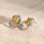 Load image into Gallery viewer, Two Tone Ring Knot Earrings
