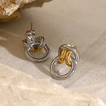 Load image into Gallery viewer, Two Tone Ring Knot Earrings
