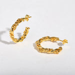 Load image into Gallery viewer, 14k Dainty Textured Spiral Hoop Earrings
