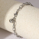 Load image into Gallery viewer, Chunky Paperclip Tassel Ball Bracelet
