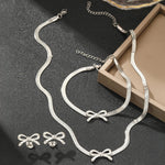 Load image into Gallery viewer, Feminine Bow Herringbone Chain Necklace, Bracelet, and Earring Set
