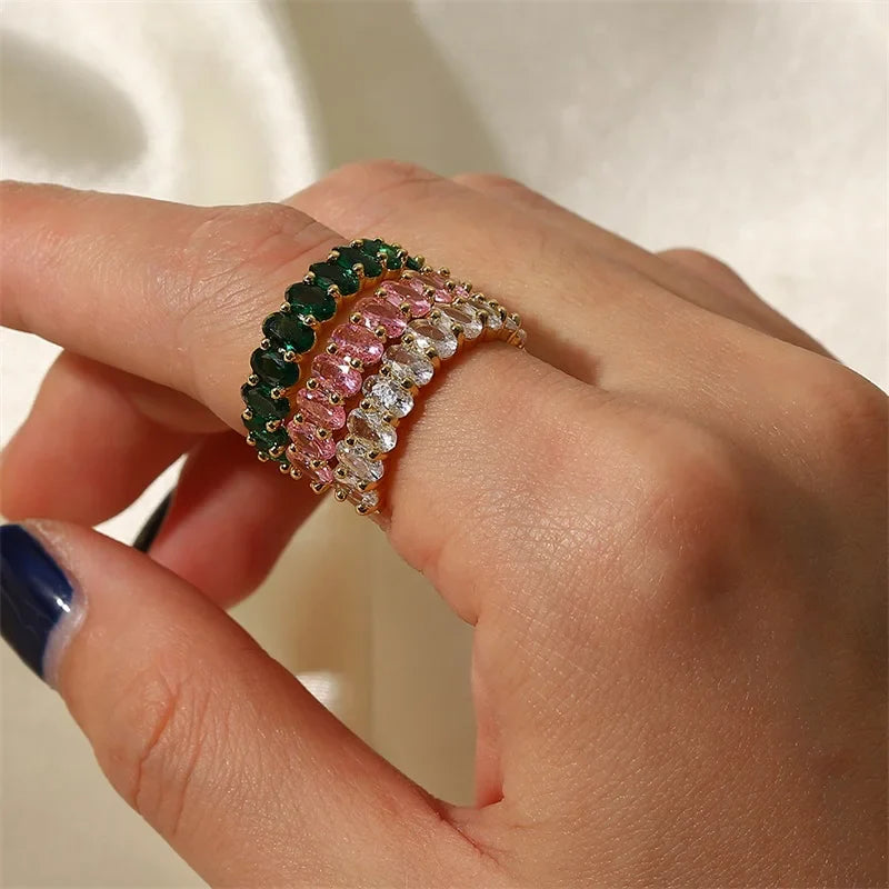 Dainty oval cut diamond adorned ring