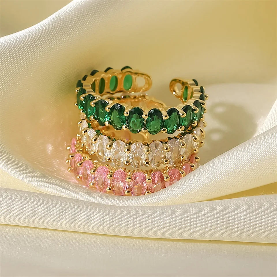 Dainty oval cut diamond adorned ring