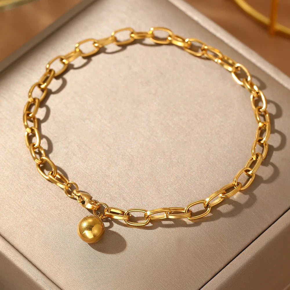 Chunky paperclip tassel ball bracelet
