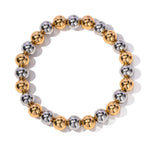 Load image into Gallery viewer, Two Tone Gold &amp; Silver Beaded Bracelet
