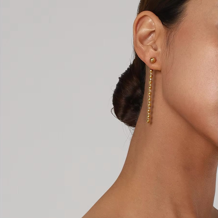 Dainty golden bead tassel earrings