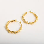 Load image into Gallery viewer, 14k Deluxe Textured Spiral Hoop Earrings
