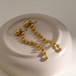 Load image into Gallery viewer, Dainty Golden Bead Tassel Earrings
