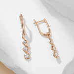 Load image into Gallery viewer, Dainty Dangle Diamonds Swirl Earrings
