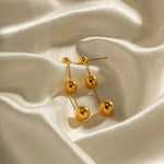 Load image into Gallery viewer, Dangle Gold Bead Tassel Earrings
