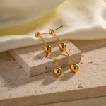 Load image into Gallery viewer, Dangle Gold Bead Tassel Earrings
