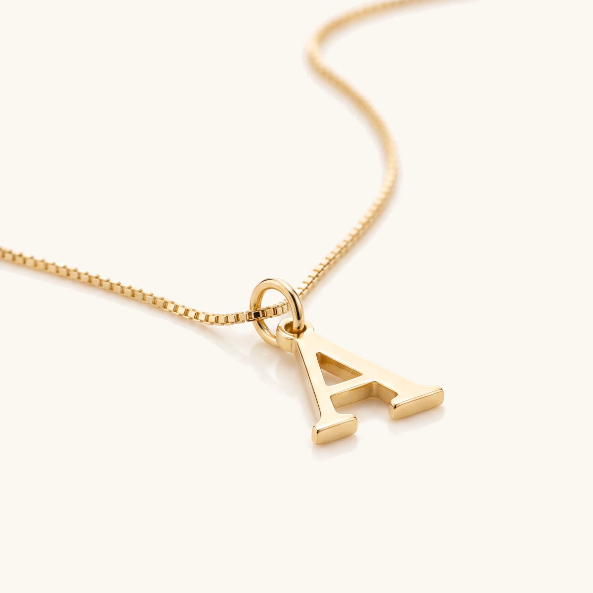 14k Sleek Serif Initial Necklace – close-up of the polished serif initial pendant