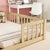 Double Twin Toddler Floor Bed with Fence and Guardrails in Natural Tones