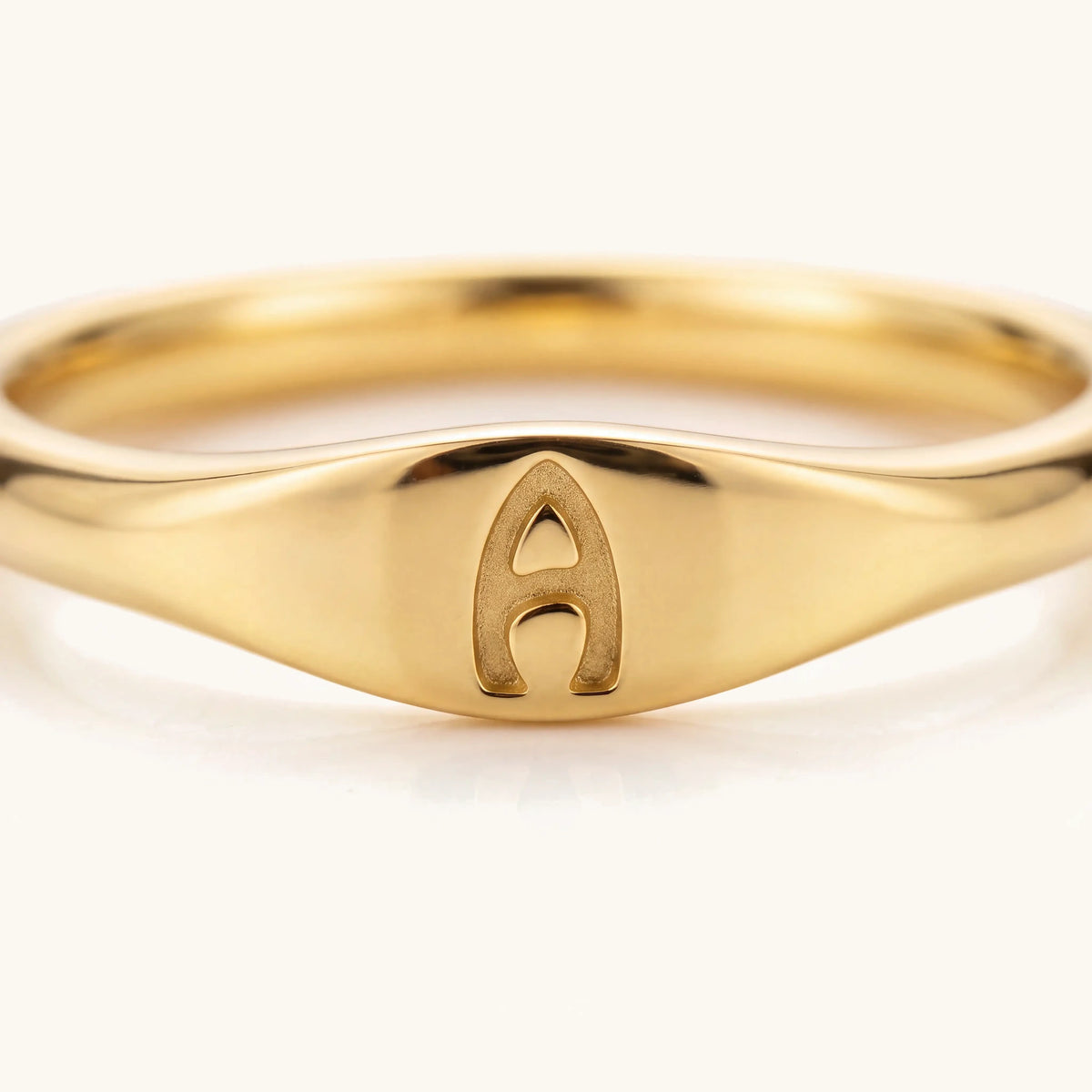 Dainty Thin Letter Initial Ring – macro detail of the engraved initial